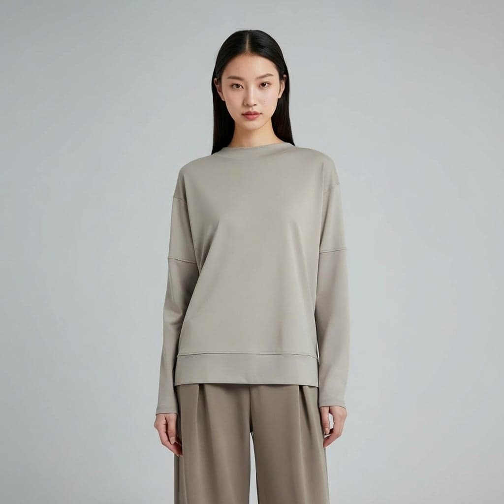 Reference photo of a woman in a grey sweater